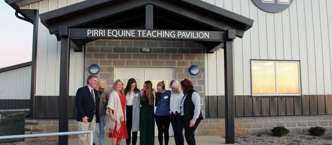 Group standing in front of the Pirri Equine Teaching Pavillion